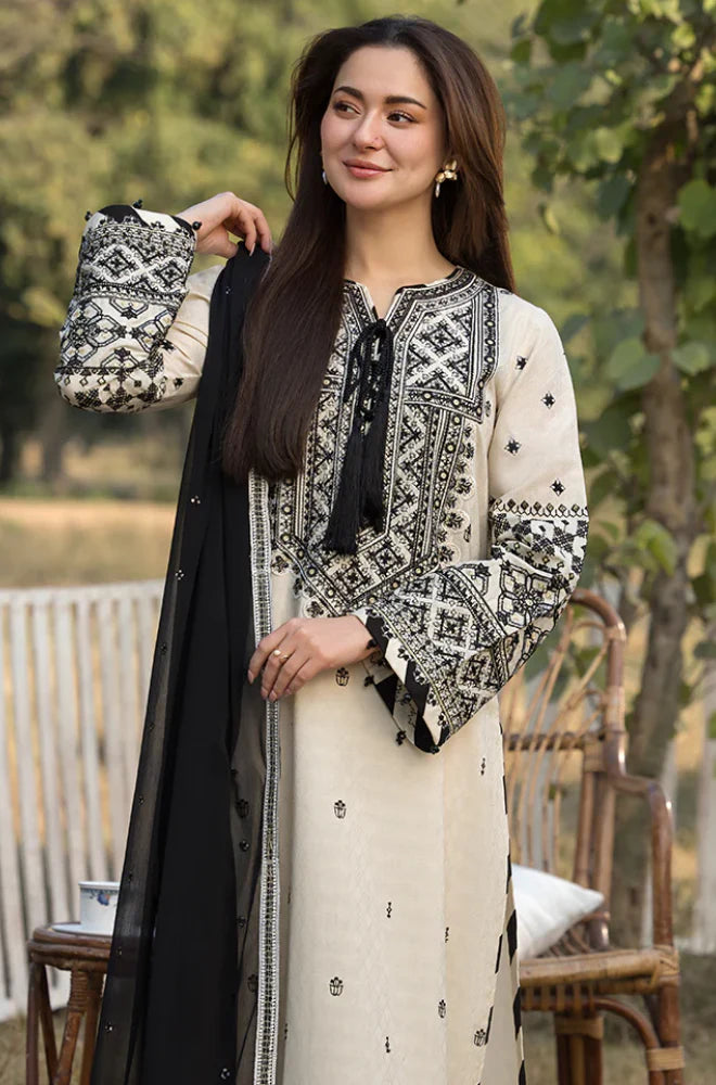Unstitched Pakistani suit by Zara with fully embroidered back and elegant daman border for formal occasions