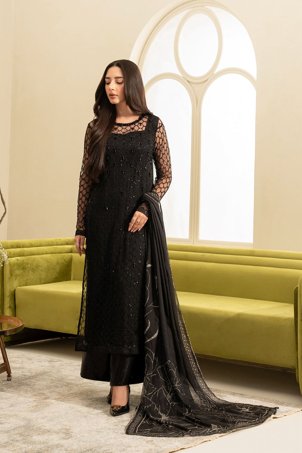 Model wearing black net sequin embroidered unstitched Lulusar replica suit with adda neckline – Mana R.