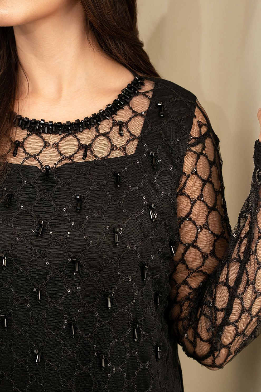 Model wearing black net sequin embroidered unstitched Lulusar replica suit with adda neckline – Mana R.